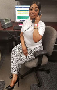 Image of program graduate working at COVID-19 call center