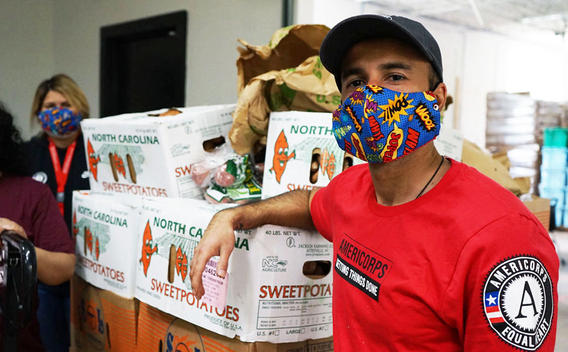 AmeriCorps - members working in a food bank