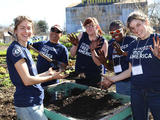 AmeriCorp - youth members working in a garden